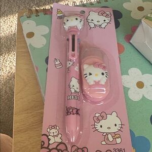 Hello Kitty Pink four color pen and wite out.